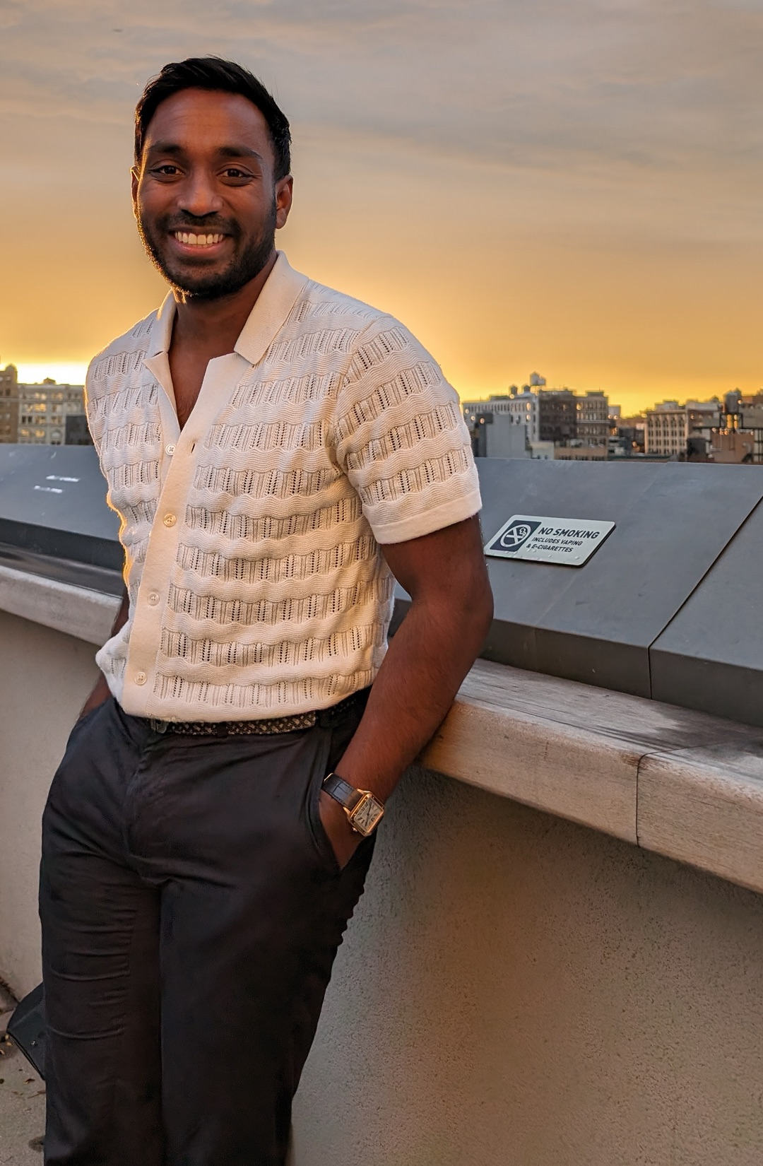 Nitesh Donti on a rooftop at sunset